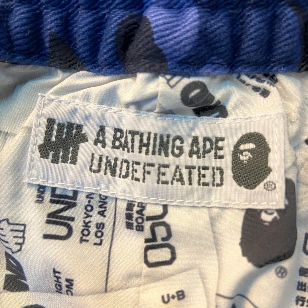 A BATHING APE x UNDEFEATED: APE x UNDEFEATED collaboration camouflage cargo pants, size S